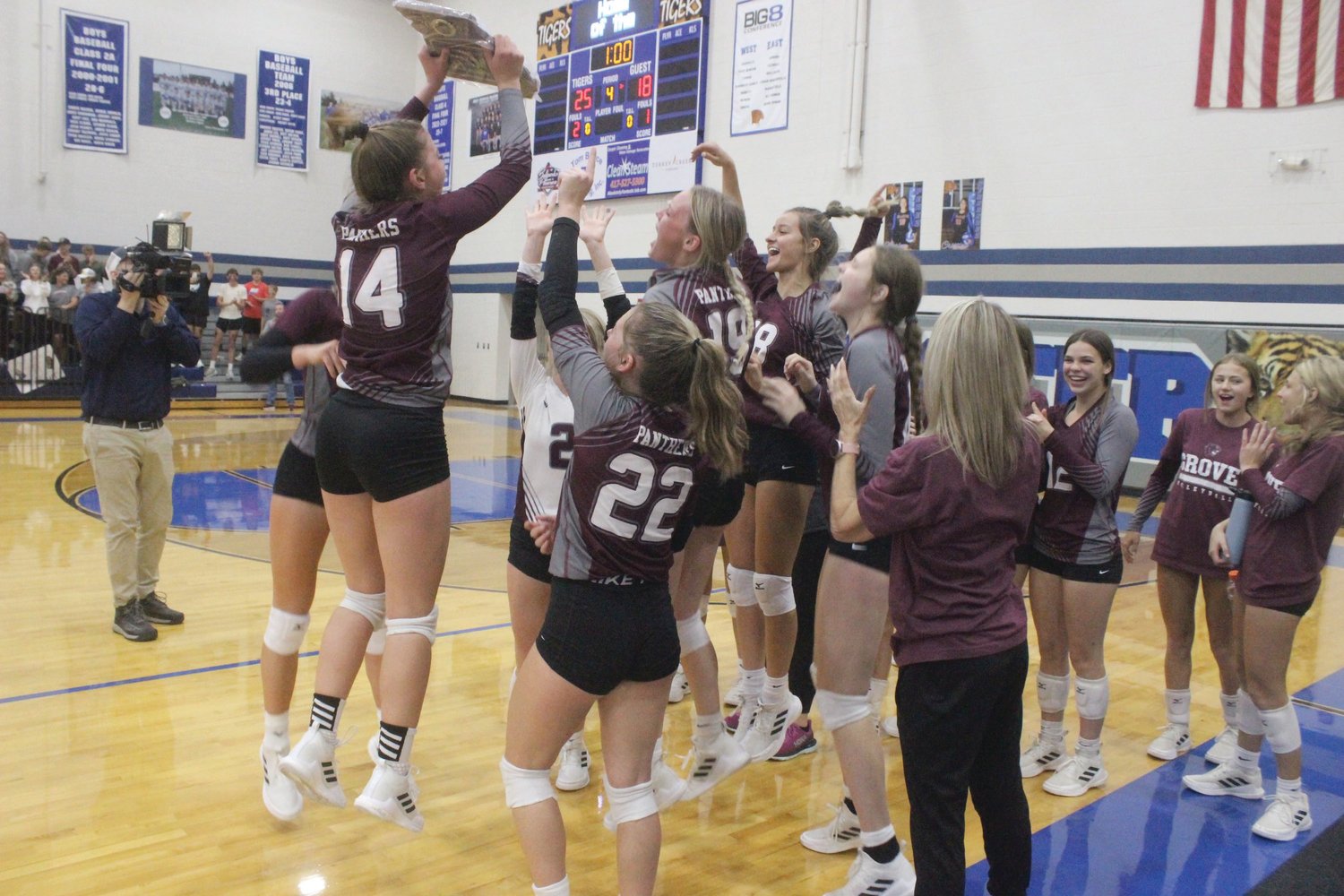 Senior Reagan Hoerning and her teammates go crazy after receiving their plaque.